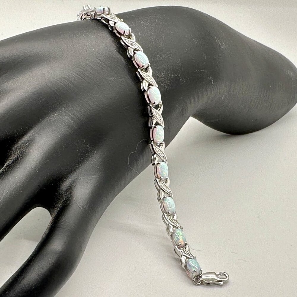 XO Infinity Bracelet Lab Created Opal and Diamond Accent in Sterling Silver Sett - Picture 1 of 7